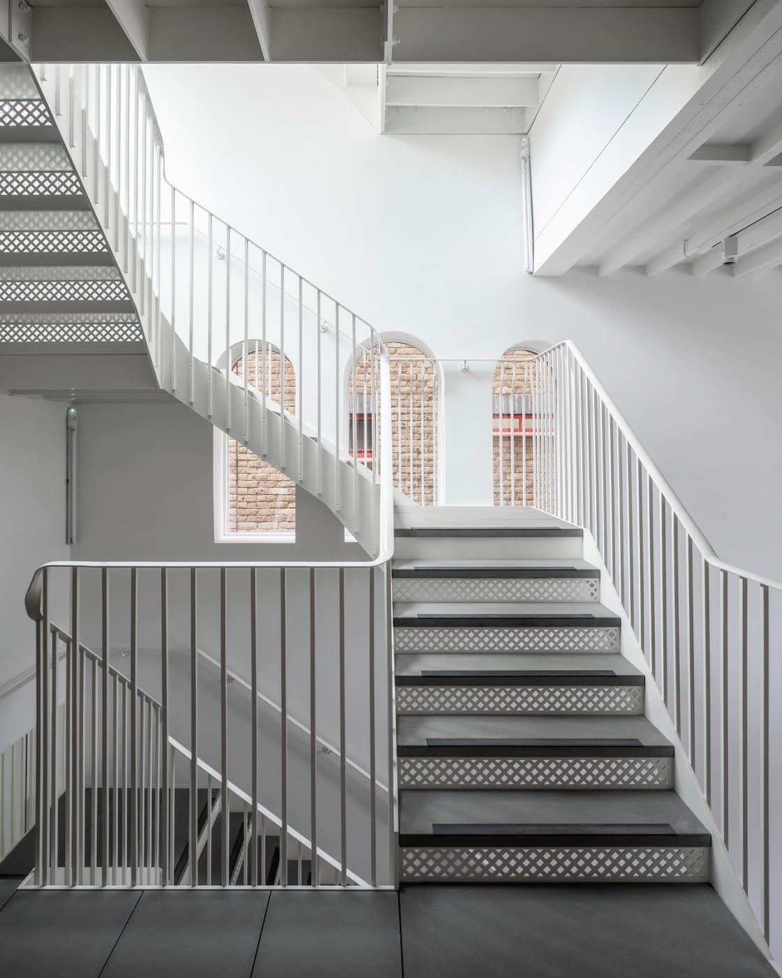 Ultraclear LandVac Glass in bight and airy gallery stairwell